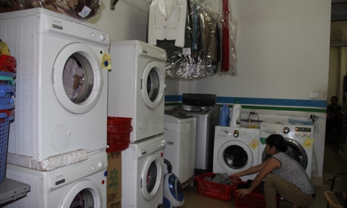 Dịch vụ giặt là kiếm bộn tiền nhờ mưa phùn kéo dài 