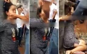 Dân làng Trung Quốc trói và đánh đập một phụ nữ mang thai