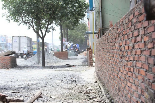 TP.HCM: Hạ thấp cao độ đường Kinh Dương Vương để bớt 'hành hạ' người dân
