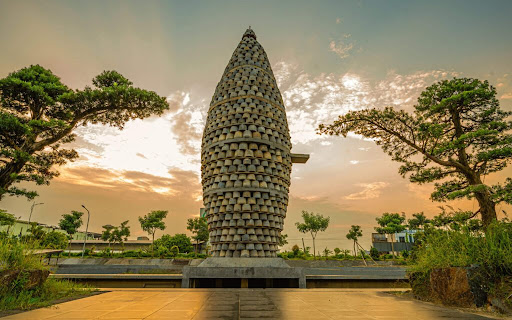 Chiêm ngưỡng ngọn tháp 5 tầng hình hạt lúa ghép từ hơn 1.000 chiếc cối đá lớn nhất Việt Nam, được xác lập kỷ lục châu Á