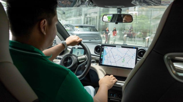 Cái bắt tay giữa Grab và hãng xe điện số 1 thế giới: Cam kết thu nhập 25 triệu đồng/kỳ cho tài xế