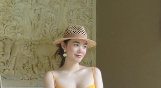 “Soi” guu thời trang sành điệu của mẹ bầu 5 tháng Minh Hằng khi đi biển
