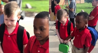 21.000 người chia sẻ hình ảnh cậu bé 8 tuổi cầm tay bạn tự kỷ trong ngày đầu đến trường