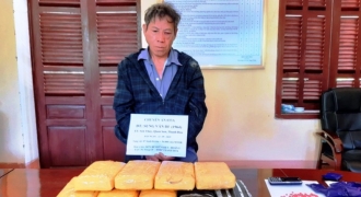Vận chuyển 7 bánh heroin, 56 nghìn viên ma túy từ Lào về Việt Nam tiêu thụ