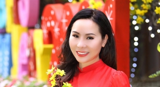 Nữ hoàng doanh nhân Ngô Thị Kim Chi dịu dàng sắc Xuân trong tà áo dài .