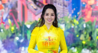 Diễn viên Mai Thu Huyền diện áo dài của NTK Đỗ Trịnh Hoài Nam tại lễ hội Áo dài Tp. Hồ Chí Minh