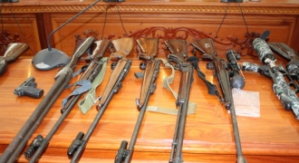 Chủ doanh nghiệp tàng trữ 30 khẩu súng cùng hàng ngàn viên đạn