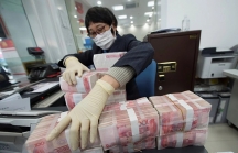Trung Quốc tiêu hủy tiền giấy ngăn virus Corona