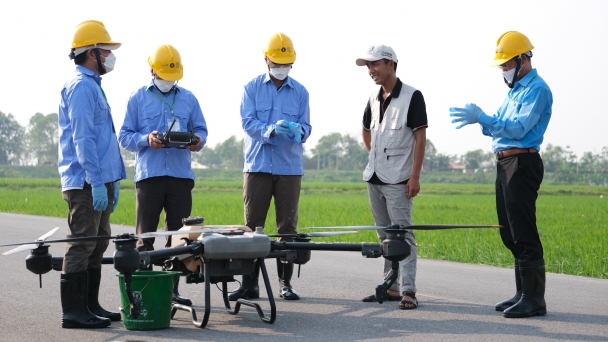 Training on operating drones to spray pesticides: A new step forward in agricultural experiment