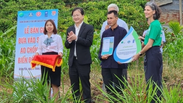 Handing over 69 climate change resilient ponds to farmers