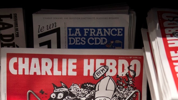 Charlie Hebdo bị chỉ trích thậm tệ vì vẽ tranh chế nhạo em bé Syria tỵ nạn