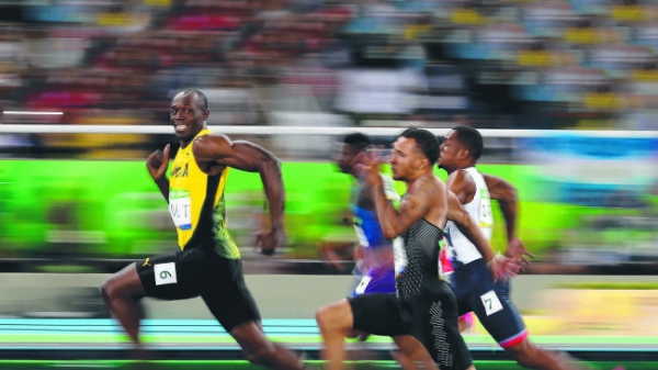 Đằng sau bức ảnh 'vừa chạy vừa chơi' của Usain Bolt