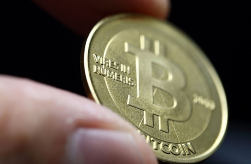 Trung Quốc cấm tiền ảo, giá Bitcoin lao dốc
