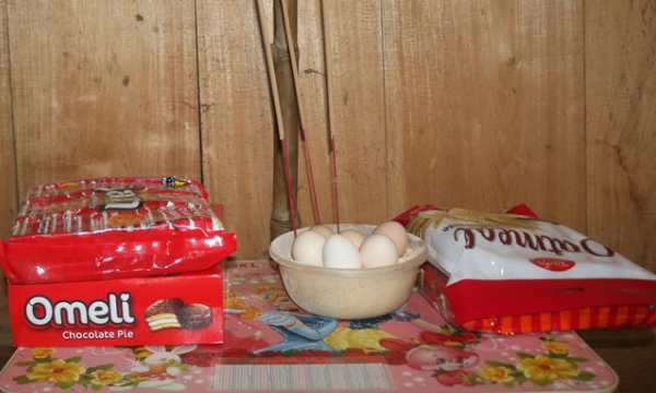 Tục dùng trứng gà để gọi hồn của đồng bào người Mông đêm 30 Tết