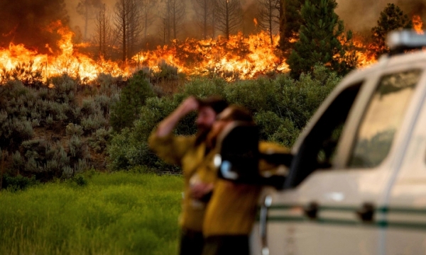 Wildfires rage in California and Oregon amid scorching heatwave