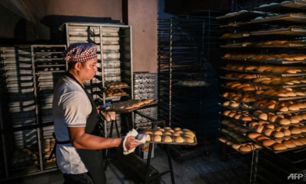 Philippine bakeries shrink 'poor man's bread' as inflation bites