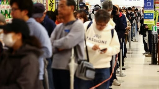 Japanese shoppers queue for hours to buy cheap rice as prices soar