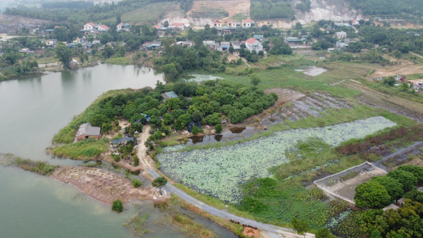 Sống gần hồ của Công ty Thủy Lợi Đông Triều nhưng cứ mưa là ngập