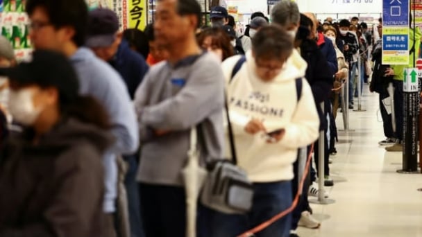 Japanese shoppers queue for hours to buy cheap rice as prices soar
