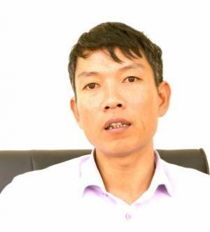 Ông Vũ Việt Đông - Trạm trưởng Trạm bơm Hữu Bị (Công ty TNHH MTV Khai thác công trình thủy lợi Bắc Nam Hà). Ảnh: Minh Phúc.