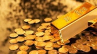 Giá vàng thế giới tăng, trong nước giảm