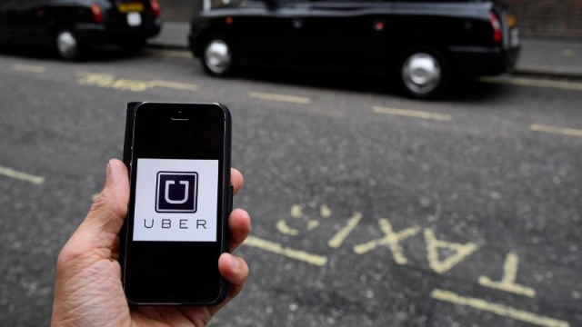 Uber 'làm hòa' với taxi truyền thống