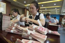 Trung Quốc hủy tiền giấy để ngăn dịch Covid-19