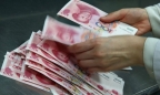 Trung Quốc cấm 3 ngân hàng ngoại kinh doanh đồng tệ xuyên biên giới