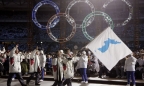 Đoàn thể thao Hàn Quốc và Triều Tiên diễu hành dưới một ngọn cờ