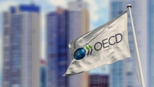 Lạm phát giảm nhanh hơn dự kiến, OECD nâng triển vọng tăng trưởng toàn cầu