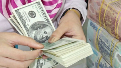 Ngân hàng Nhà nước mua vào 7 tỷ USD để tăng dự trữ ngoại hối