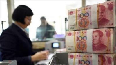 Giới phân tích cảnh báo tác động nghiêm trọng từ việc phá giá đồng NDT của Trung Quốc