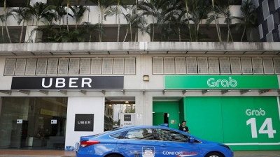 Vụ Grab mua Uber Đông Nam Á:  Singapore lo dẫn đến hạn chế cạnh tranh