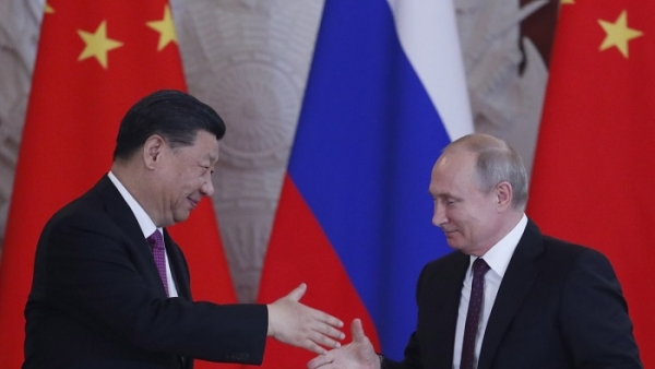 Trung Quốc và Nga bắt tay nhau để giảm sự phụ thuộc vào đồng tiền Mỹ