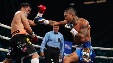 Pacquiao tái xuất ấn tượng, hòa Barrios trong trận tranh đai WBC 