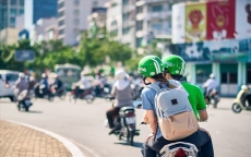 Khe cửa hẹp cho Grab Việt Nam “thoát hiểm” trong thương vụ thâu tóm Uber