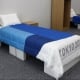 VĐV Olympic ngủ trên giường... carton