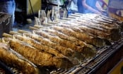 Xuyên đêm nướng hơn 5.000 con cá lóc cho ngày vía Thần Tài