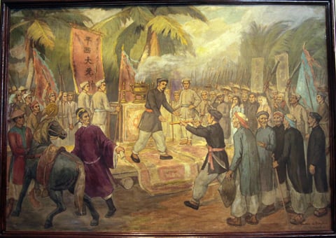 Tranh “Nhân dân Gò Công suy tôn Trương Công Định làm Bình Tây Đại Nguyên Soái” (tranh trưng bày tại Bảo tàng Lịch sử Quốc gia)